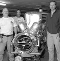 Dan Poll, Jim Budlong and Paul Derwent with the Accumulator stacktail upgrade stochastic cooling pickup tank