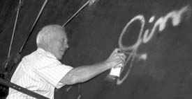 To celebrate the completion of the first MINOS supermodule, collaboration members and honored guests had the opportunity to autograph its final plate, no. 248. Congressman James Oberstar (above) was one of over fifty people who signed their names on this eight-meter octagon made of steel and plastic scintillator.