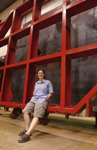 At New Muon Lab, Pam gets a sense of scale from a component of the near detector for the MINOS neutrino experiment.