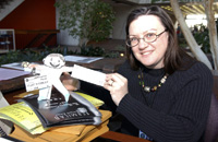 Flat Stanley meets Wilson Hall receptionist, Kathy Johnson.