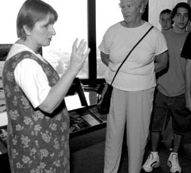 Nancy Lanning points out the attractions on Wilson Hall's 15th floor.