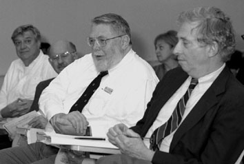 John O'Fallon(center) director of the High Energy Physics Division of the U.S. Department of Energy