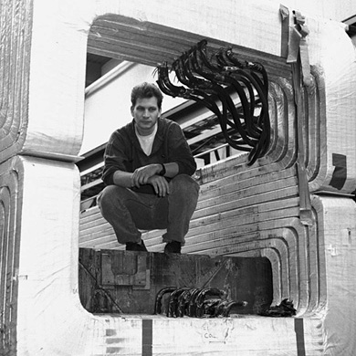 DONUT spokesman Vittorio Paolone, University of Pittsburgh, poses inside the magnet used to eliminate charged particles from the neutrino beam