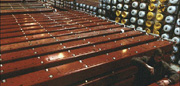 This image from 1983 shows a stockpile of Tevatron magnets before they were installed in the tunnel